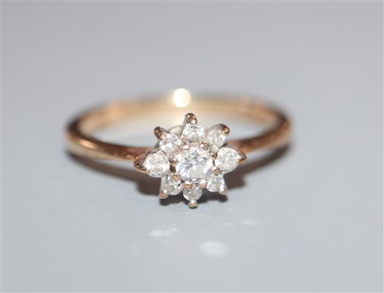 A 9ct gold and diamond cluster ring, size J.